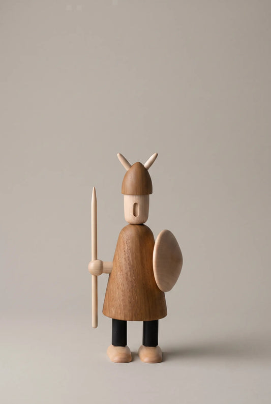 Nordic Mythos Viking Wood Sculpture crafted from Solid Teak and Natural Maple Wood, featuring light-absorbing matte wood grain surface under diffused overhead studio illumination.