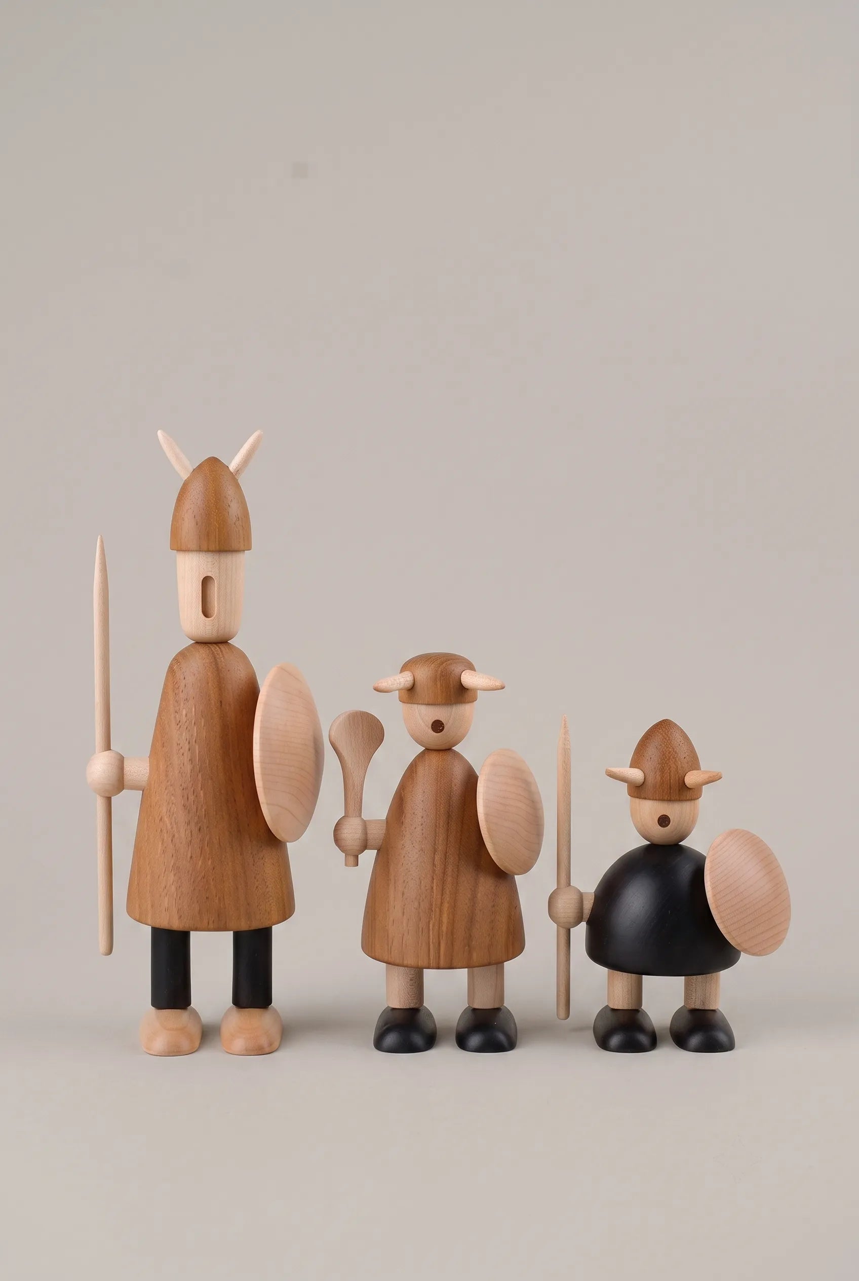 Nordic Mythos Viking Wood Sculptures crafted from Solid Teak and Natural Maple, featuring Glare-free matte natural oil surface under diffused overhead studio illumination.